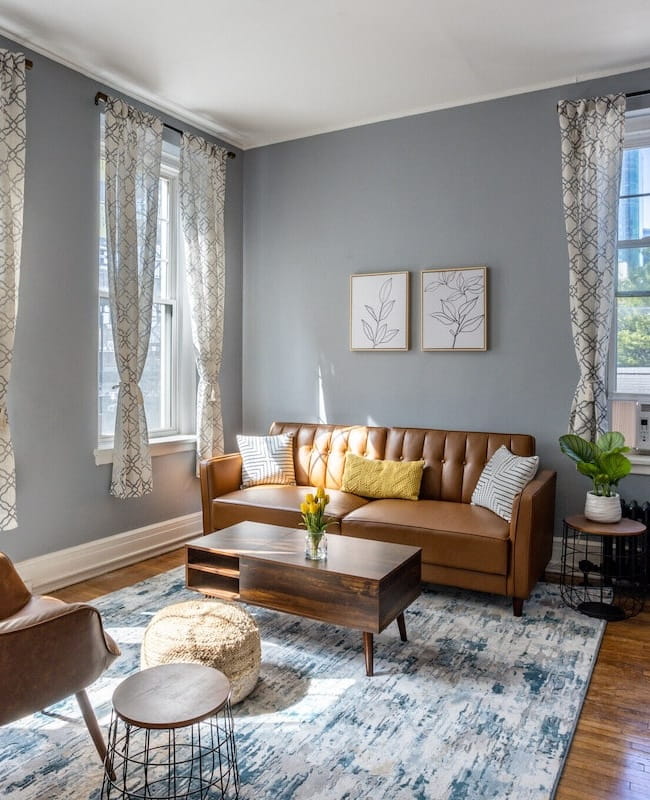 staged apartment couch and chair